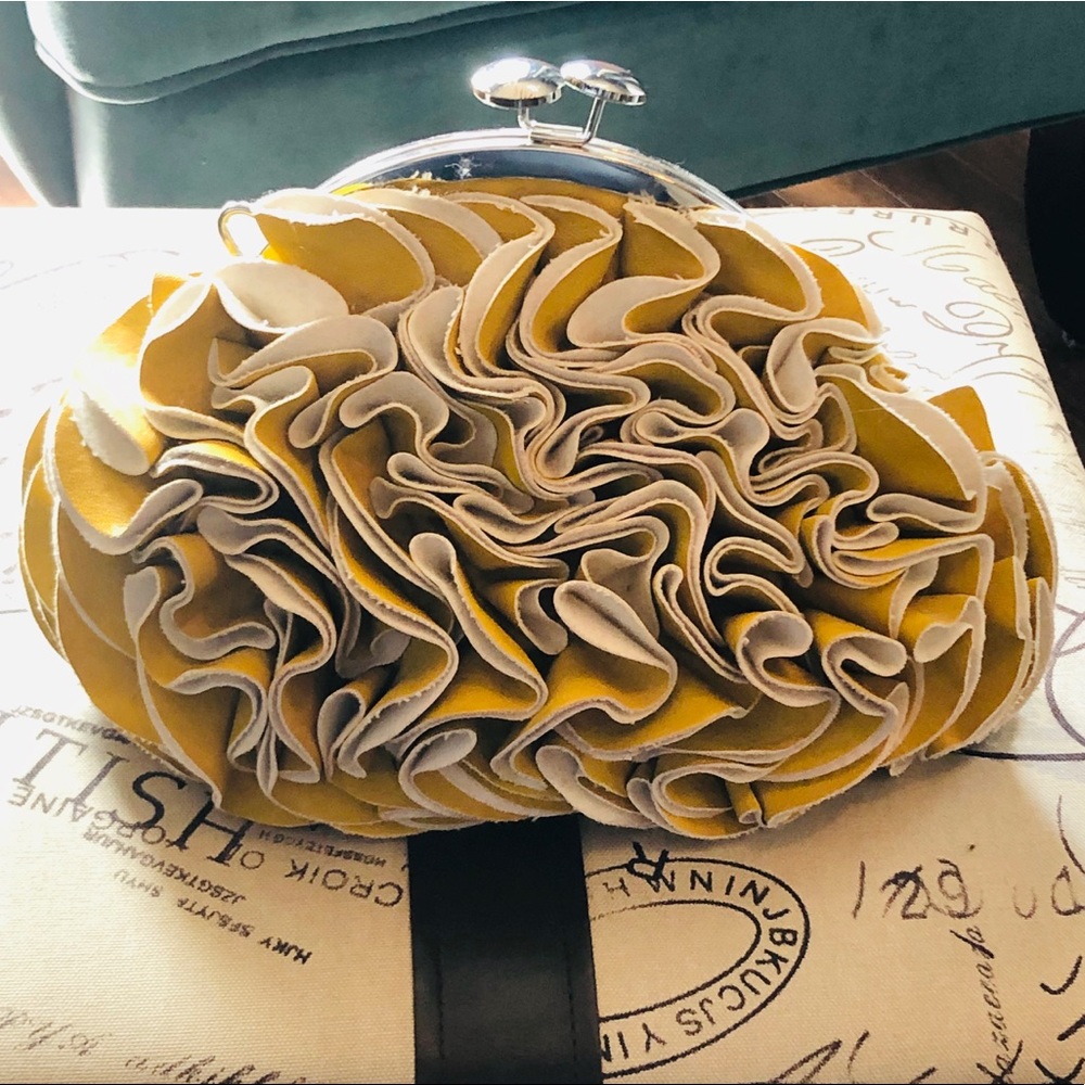 Yellow leather wave clutch with coin purse closure